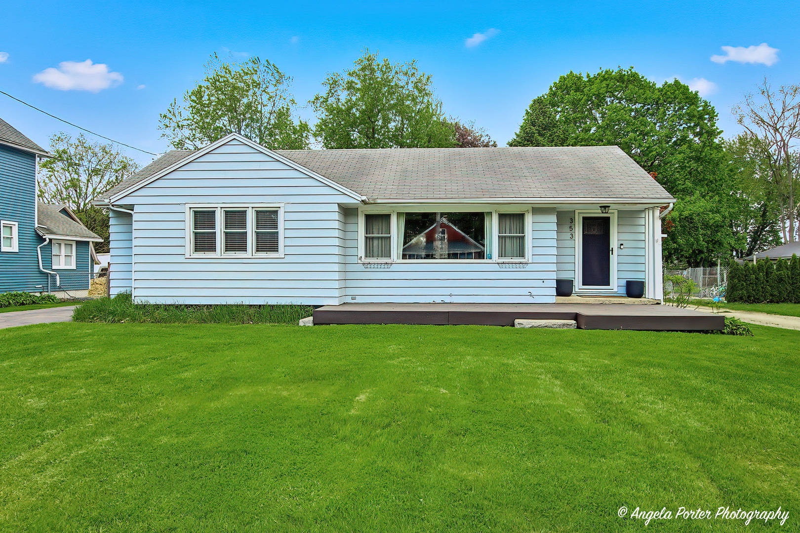 353 Marengo Road Harvard, IL 60033 - Photo 1 of 23 a front view of a house with a garden