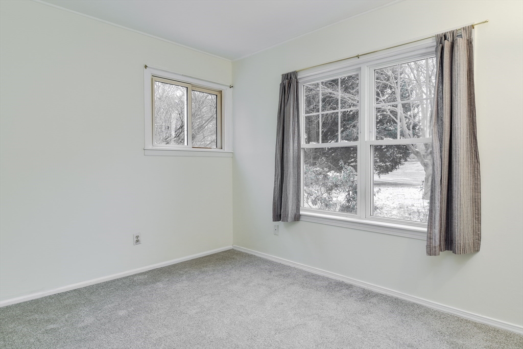 10 Kelsey Road Natick, MA 01760 - Photo 14 of 24 an empty room with a window