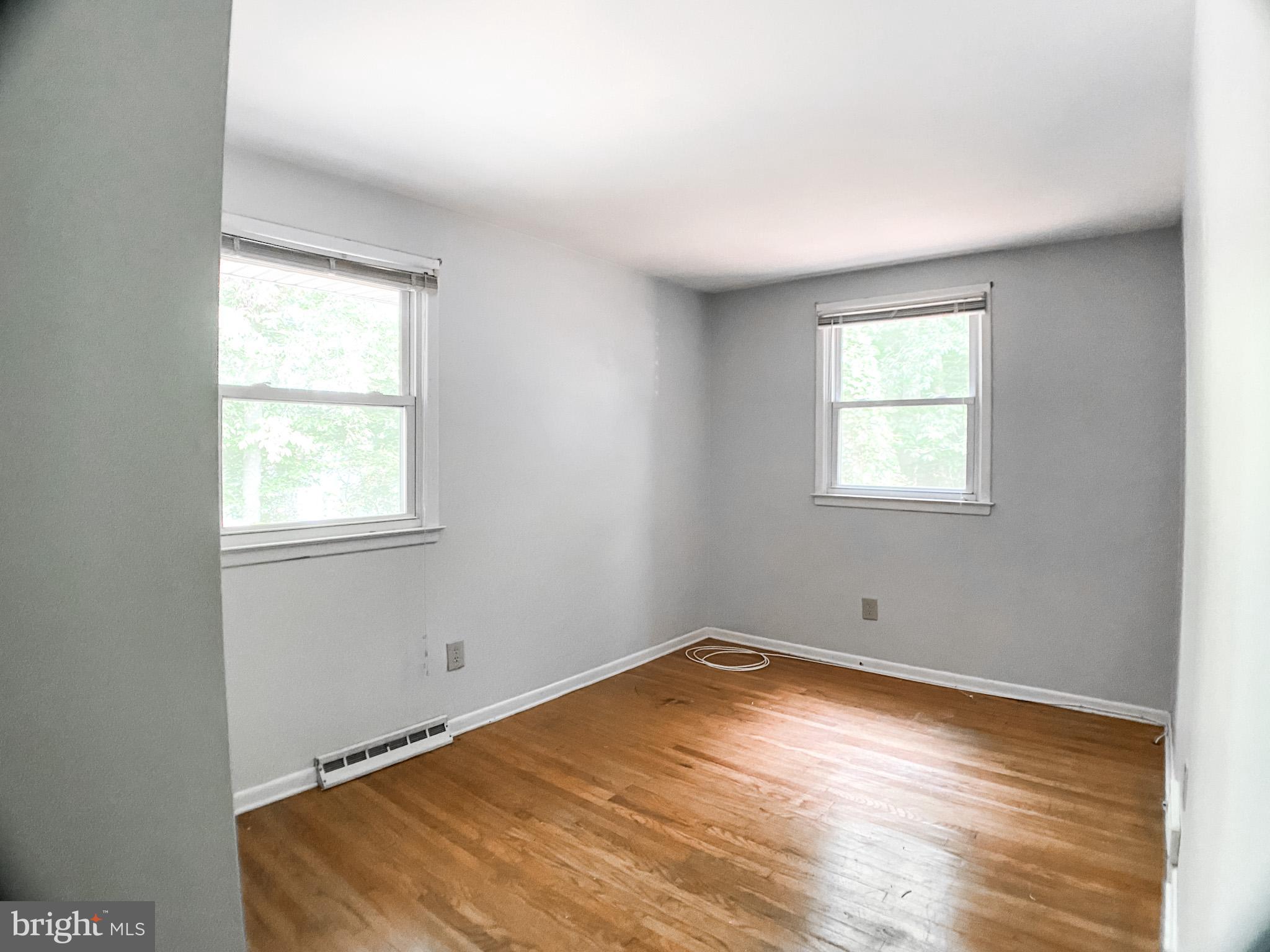 651 Lake Boulevard Lindenwold, NJ 08021 - Photo 23 of 37 a room with a window and wooden floor