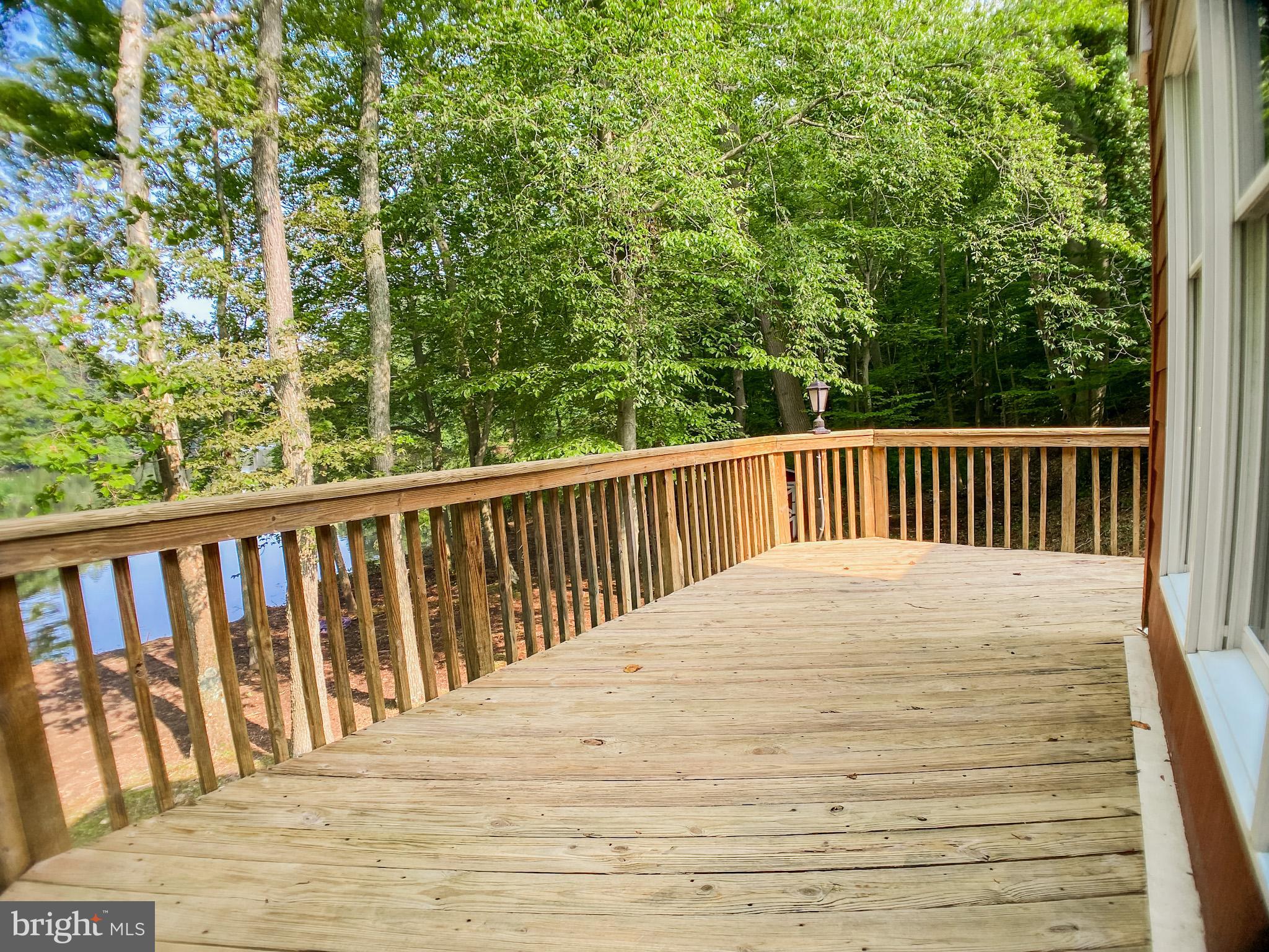 651 Lake Boulevard Lindenwold, NJ 08021 - Photo 37 of 37 a view of balcony with wooden floor and fence