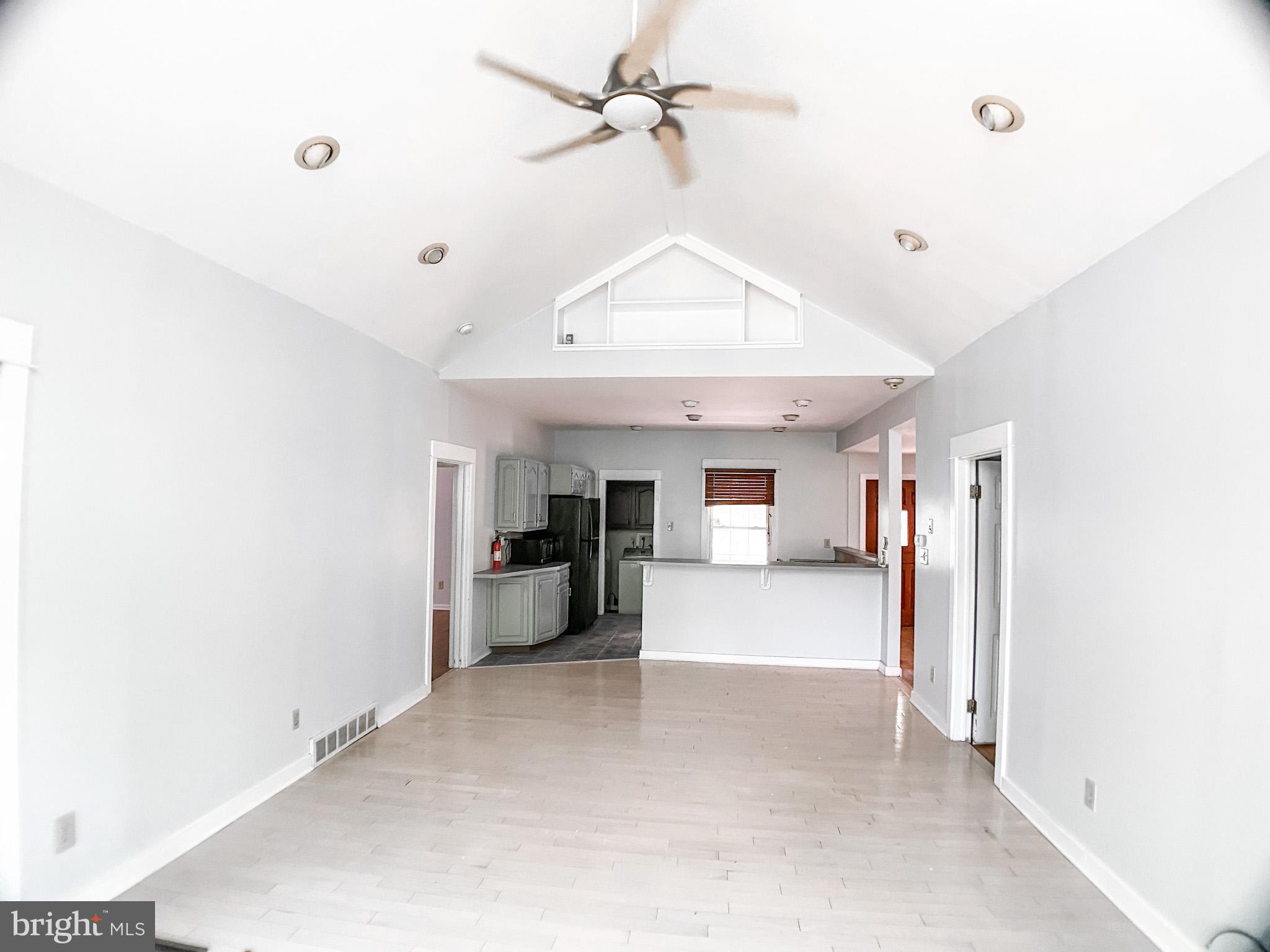 651 Lake Boulevard Lindenwold, NJ 08021 - Photo 6 of 37 a view of a kitchen with a sink and a refrigerator