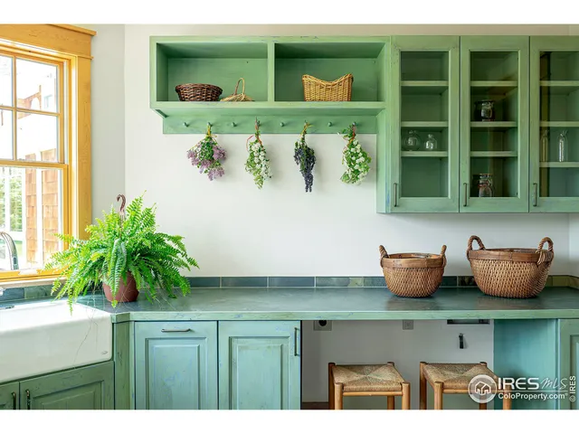 a living room with granite countertop furniture and a sink