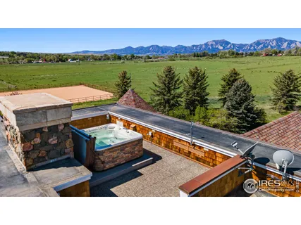 a picture of a big room with table and chairs