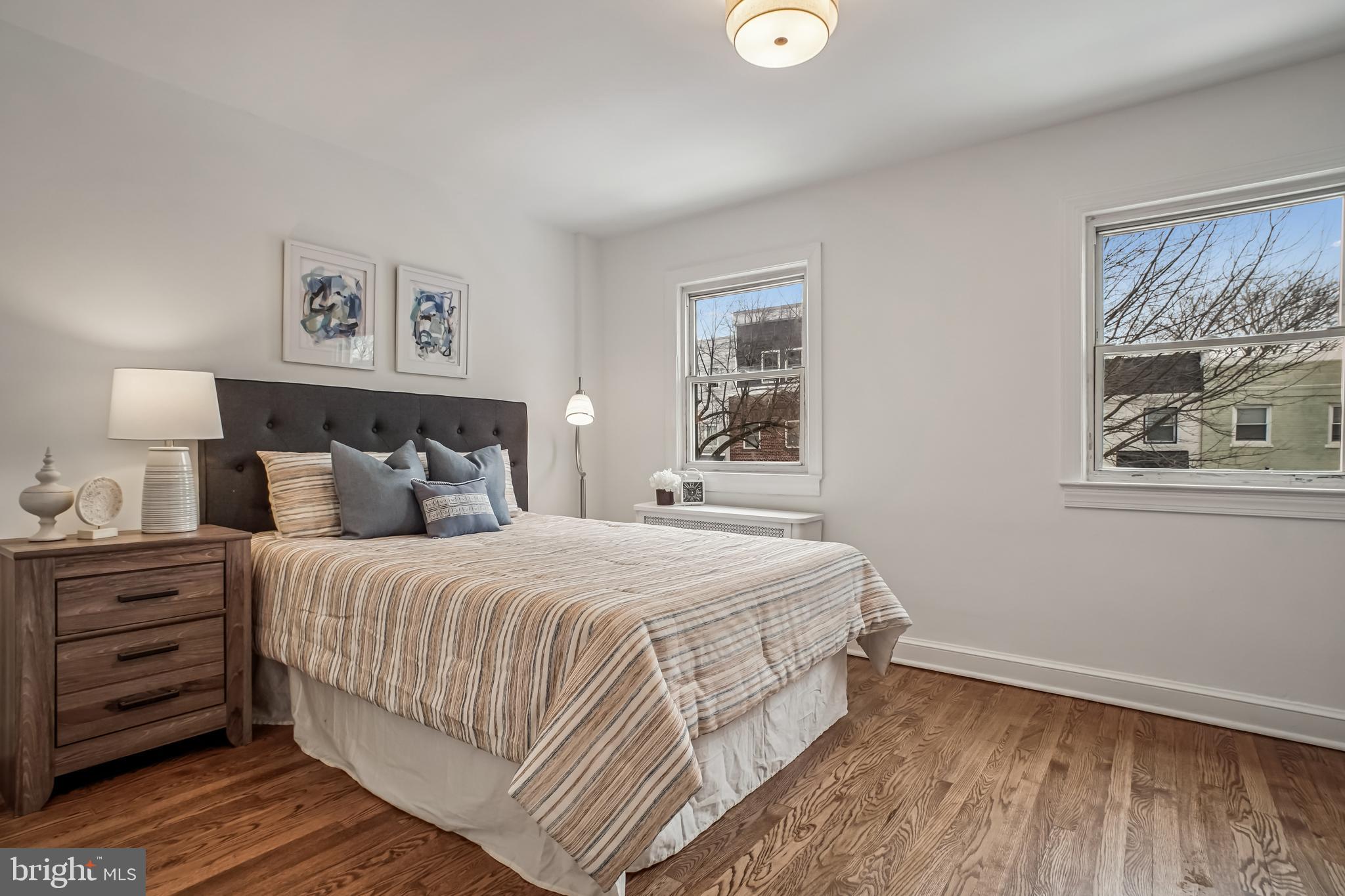 423 20th Street Northeast Washington, DC 20002 - Photo 24 of 35 a bedroom with a bed and a window