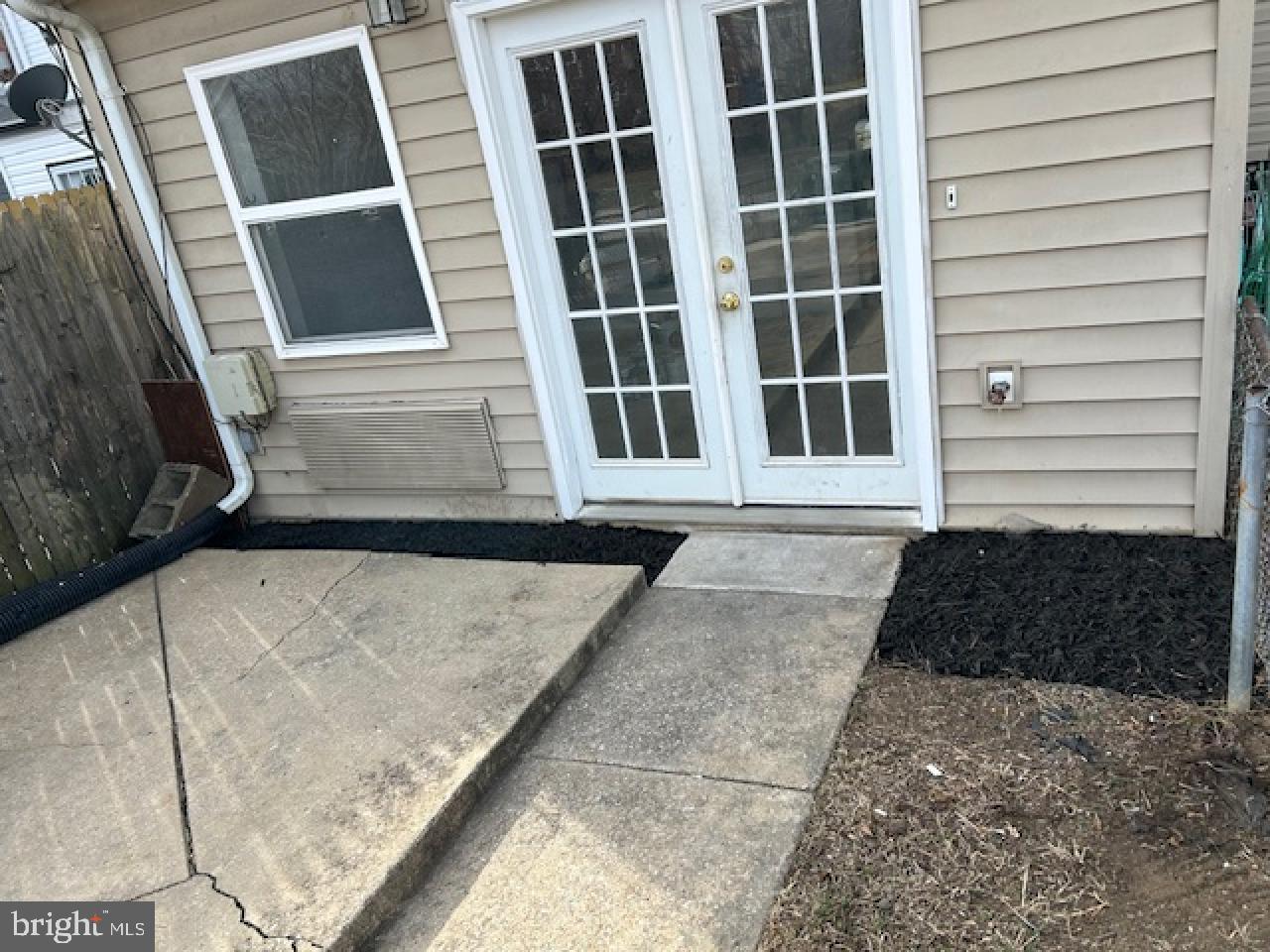 423 20th Street Northeast Washington, DC 20002 - Photo 34 of 35 a front view of a house with a yard