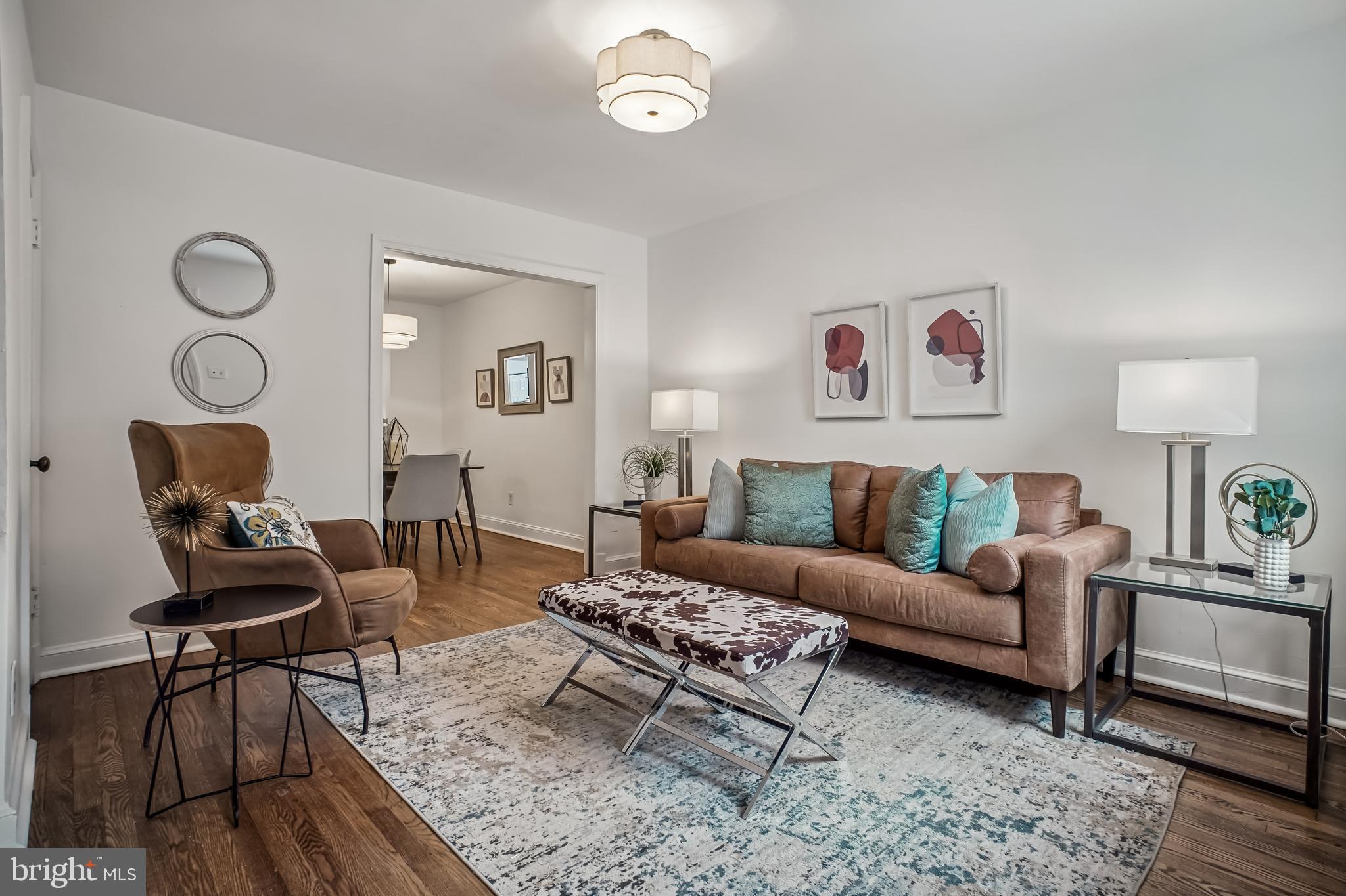 423 20th Street Northeast Washington, DC 20002 - Photo 8 of 35 a living room with furniture and a window