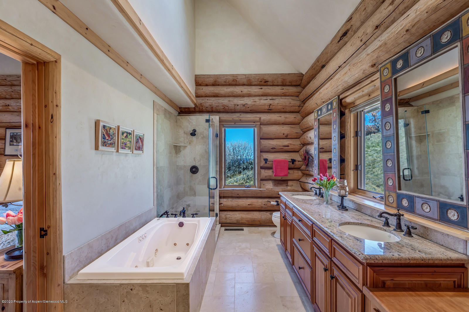 1121 Spring Park Road Carbondale, CO 81623 - Photo 16 of 41 a bathroom with a tub sink and mirror