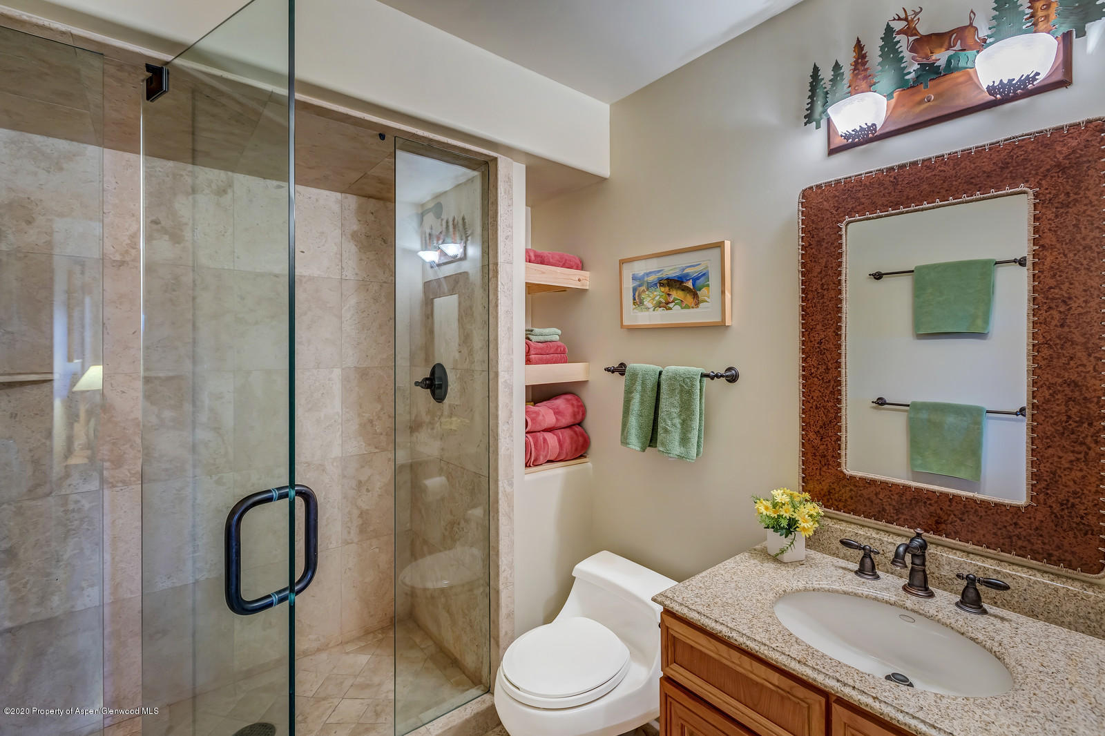 1121 Spring Park Road Carbondale, CO 81623 - Photo 27 of 41 a bathroom with a granite countertop sink toilet and shower