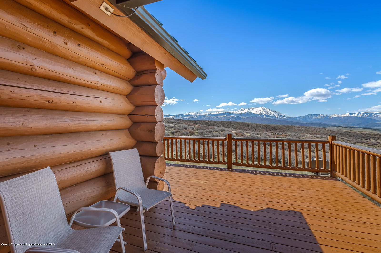 1121 Spring Park Road Carbondale, CO 81623 - Photo 32 of 41 a view of balcony with wooden floor and outdoor seating