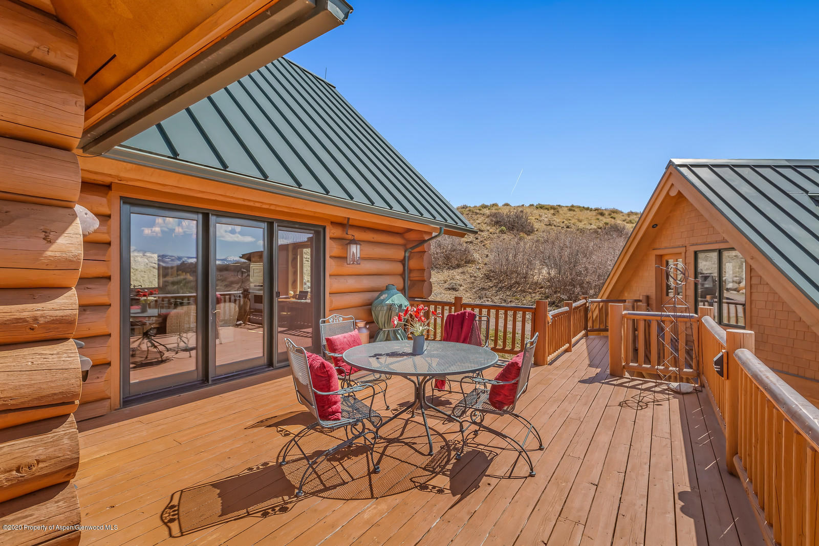1121 Spring Park Road Carbondale, CO 81623 - Photo 34 of 41 a patio with glass top table and chairs