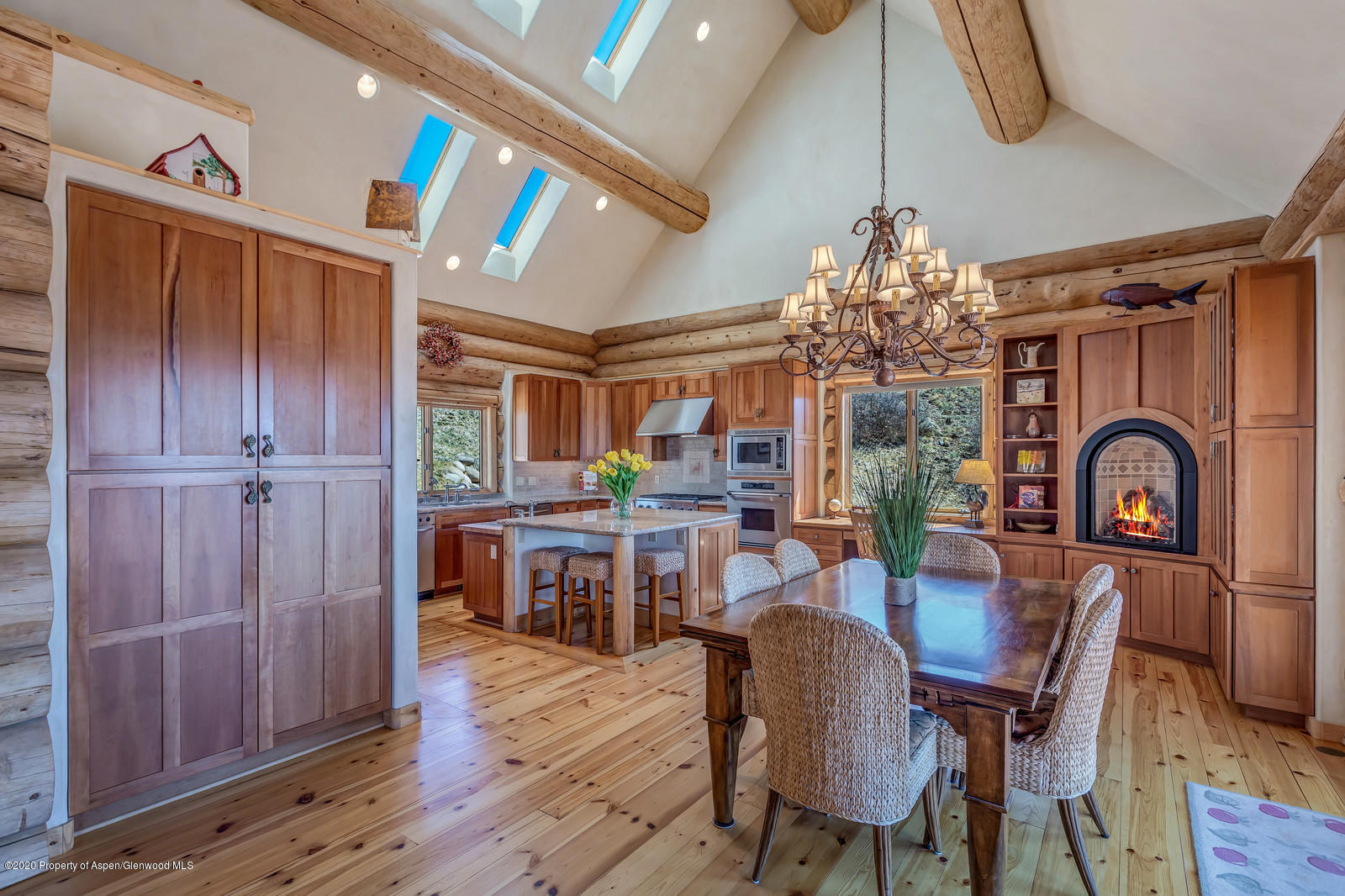 1121 Spring Park Road Carbondale, CO 81623 - Photo 10 of 41 a view of a dining room with furniture and chandelier