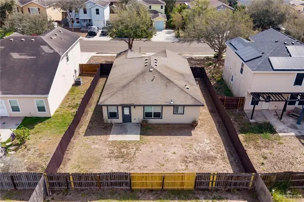 an aerial view of residential houses with wooden stairs