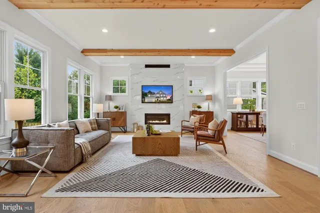 a kitchen with stainless steel appliances granite countertop a stove refrigerator and cabinets