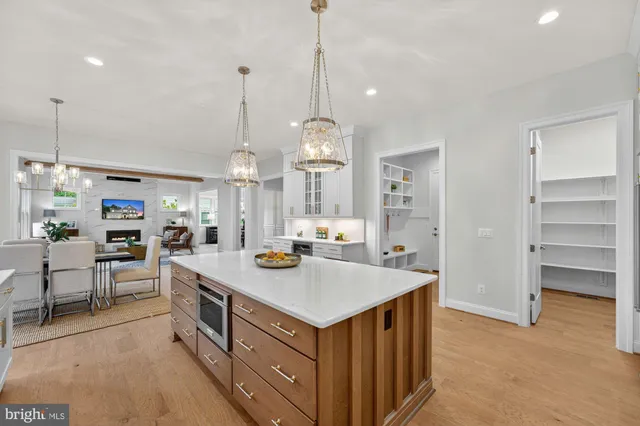 a view of an empty room with a bathroom