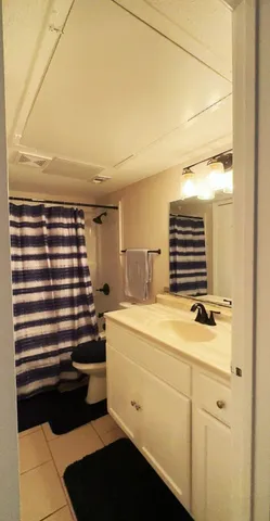 a bathroom with a sink and a washing machine