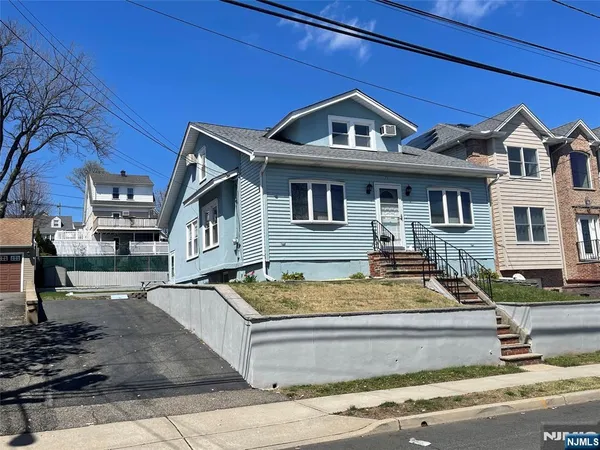 a front view of a house with entertaining space