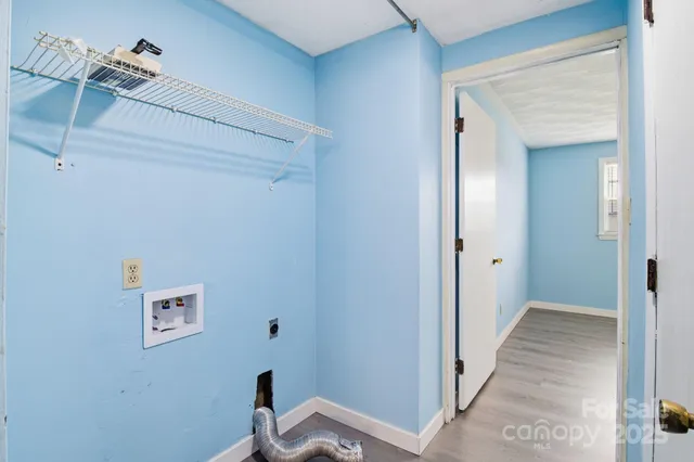 a view of a hallway with front door