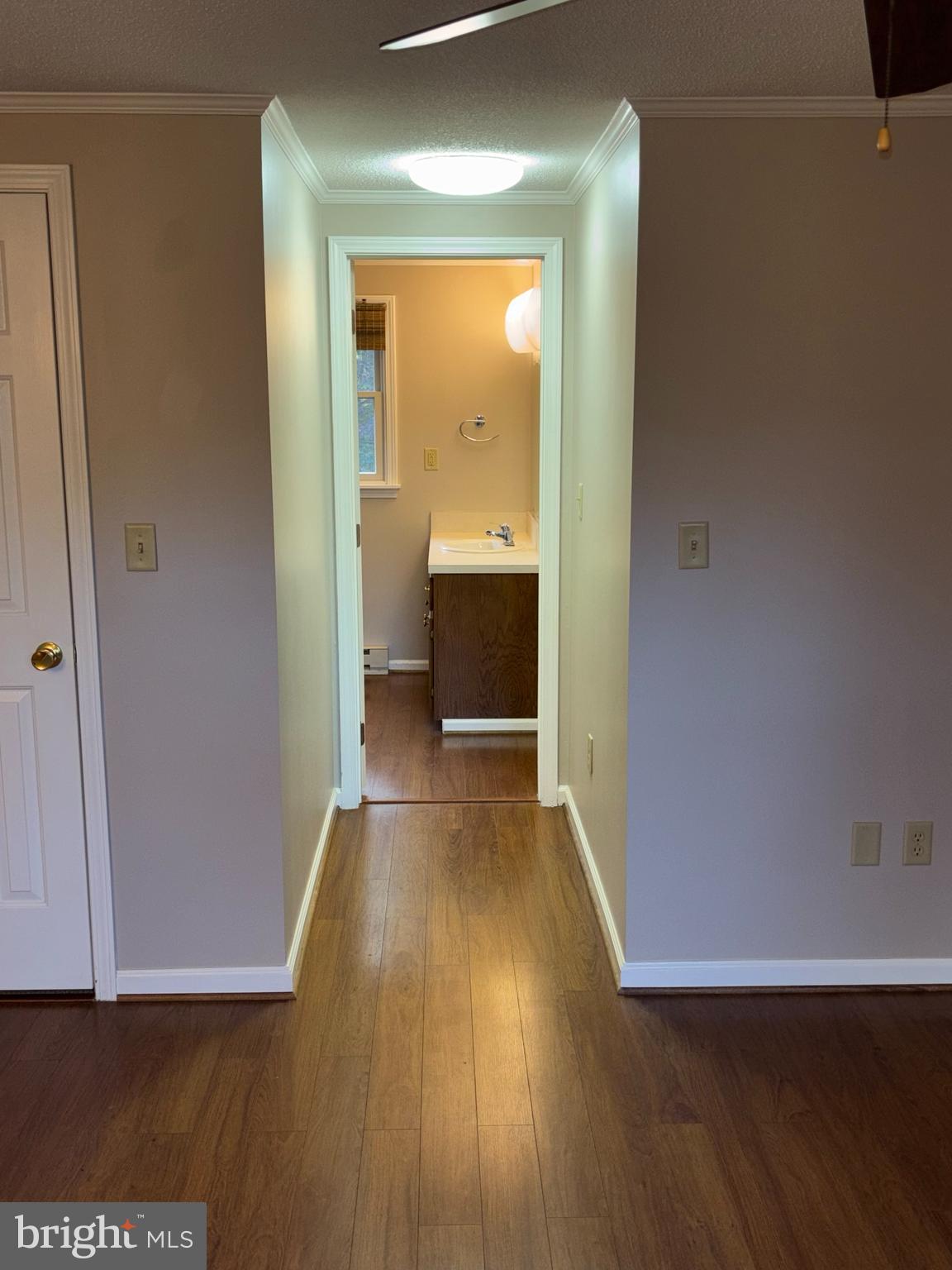 25 Nelson Lane Berkeley Springs, WV 25411 - Photo 12 of 27 a view of a hallway with wooden floor