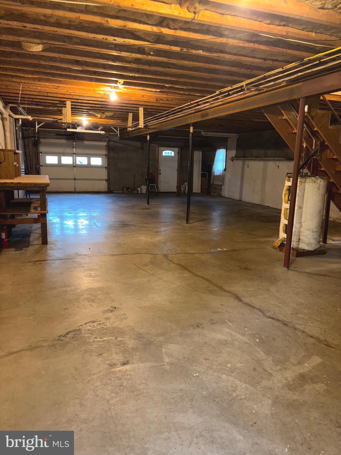 25 Nelson Lane Berkeley Springs, WV 25411 - Photo 20 of 27 a view of parking garage with cars