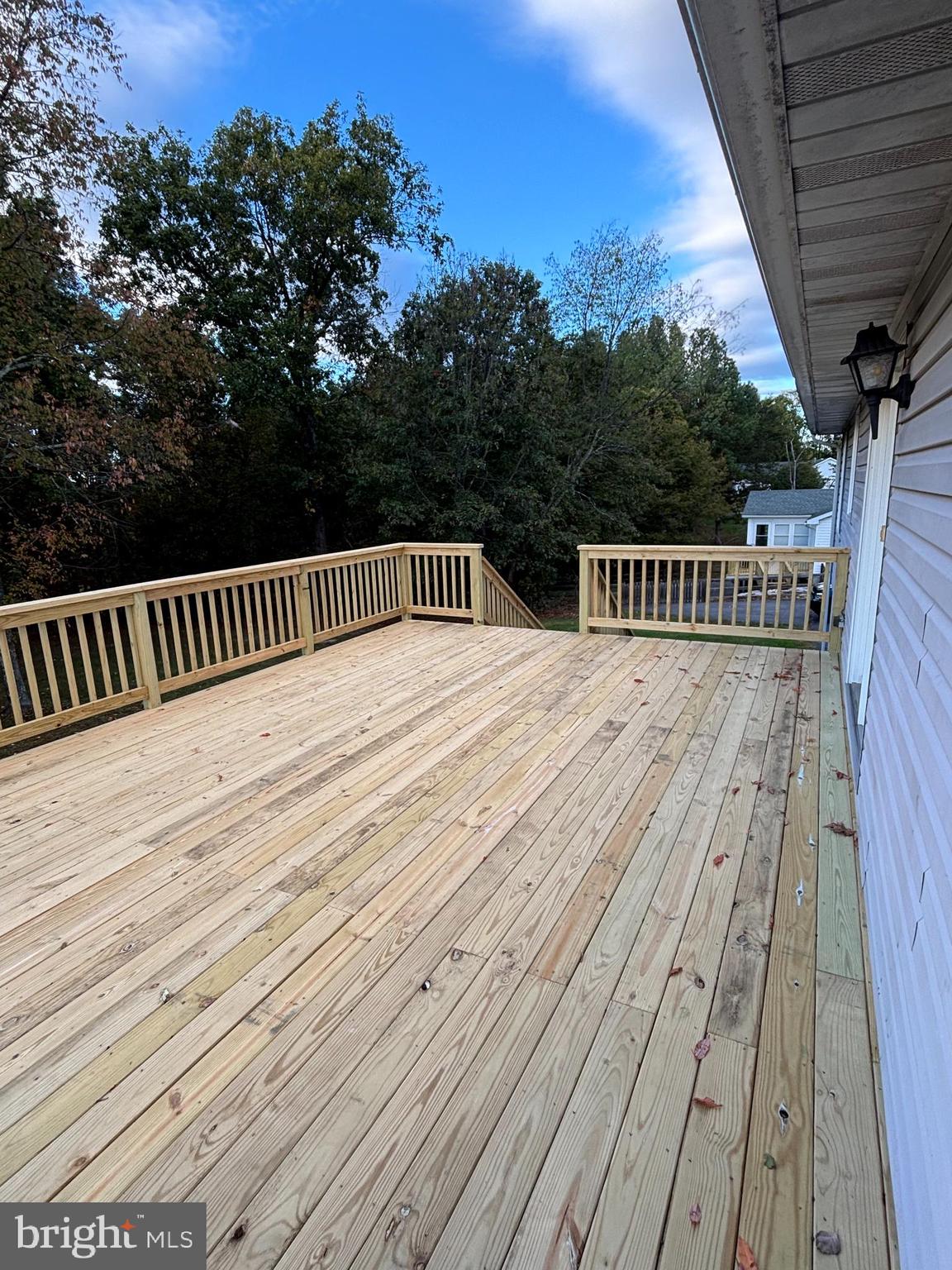 25 Nelson Lane Berkeley Springs, WV 25411 - Photo 21 of 27 a view of balcony with wooden floor and fence