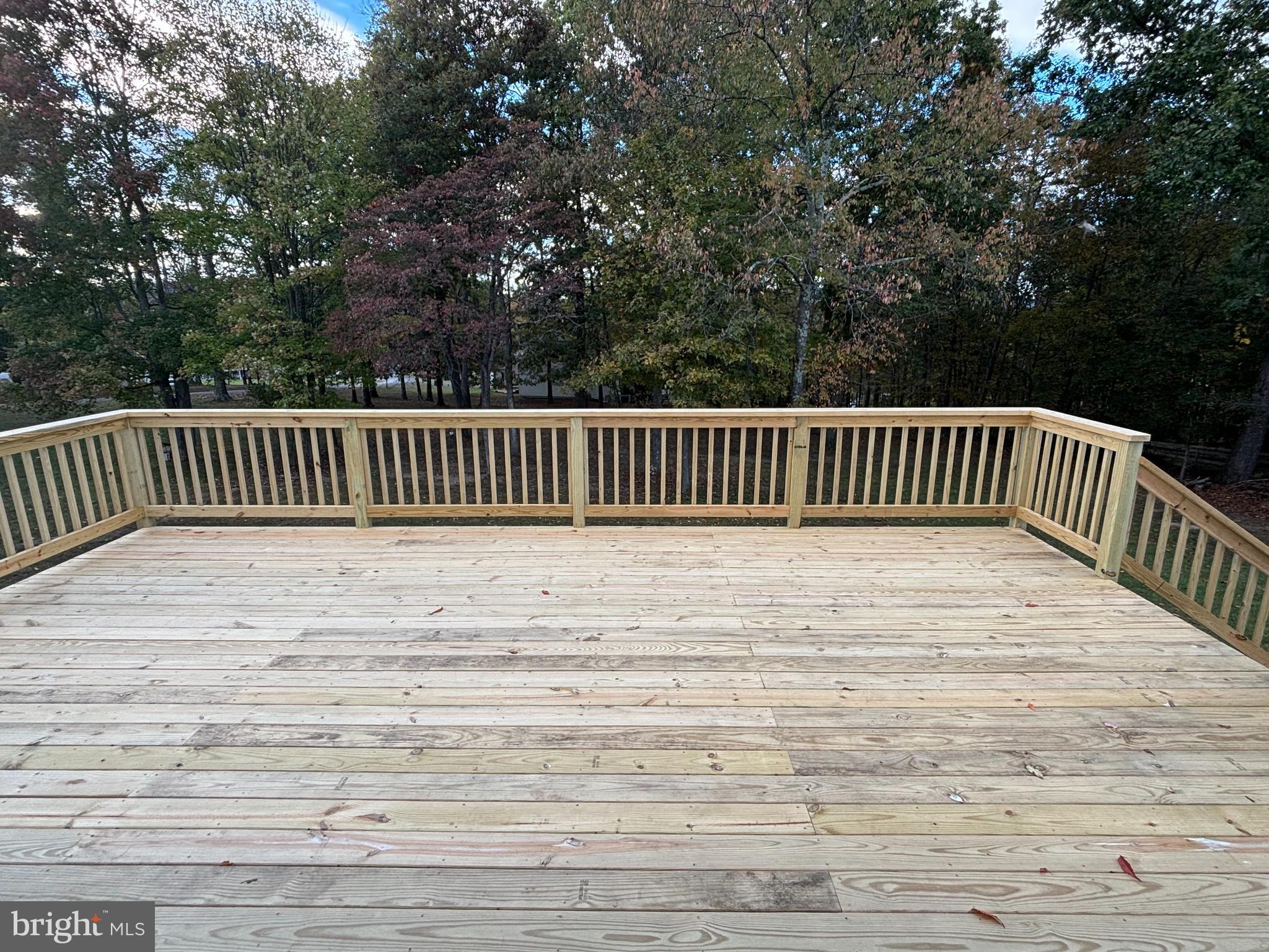 25 Nelson Lane Berkeley Springs, WV 25411 - Photo 23 of 27 a view of balcony with wooden floor and fence