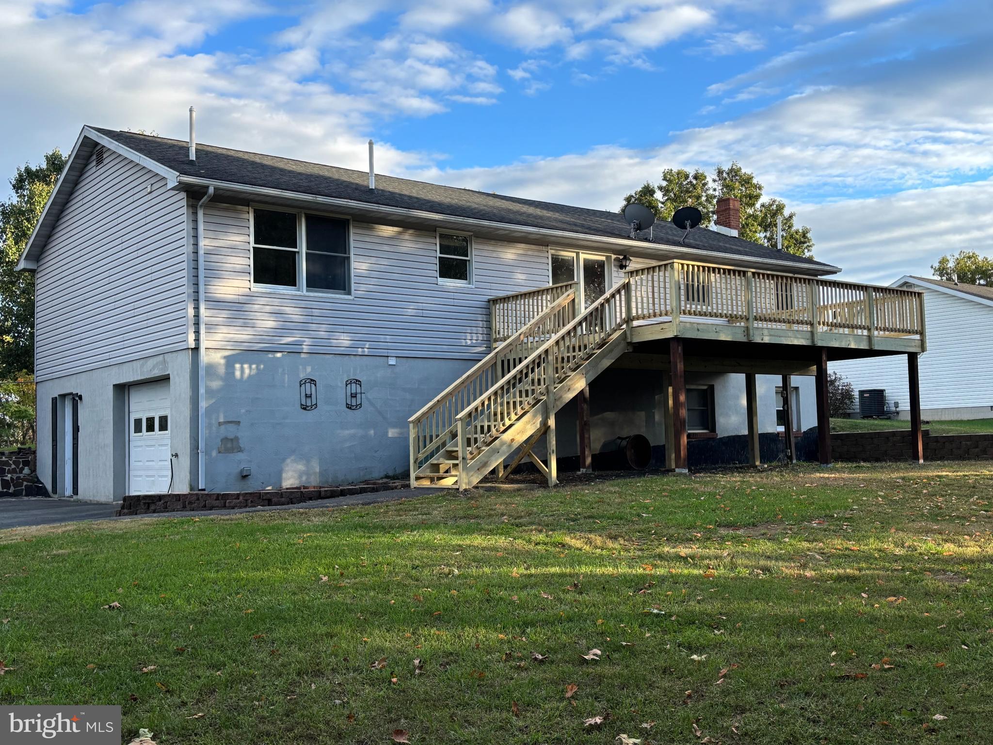 25 Nelson Lane Berkeley Springs, WV 25411 - Photo 24 of 27 a view of a house with a backyard