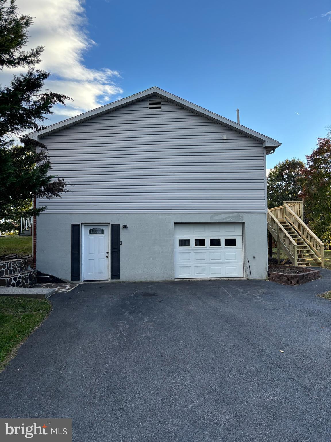 25 Nelson Lane Berkeley Springs, WV 25411 - Photo 26 of 27 a view of a house with a yard