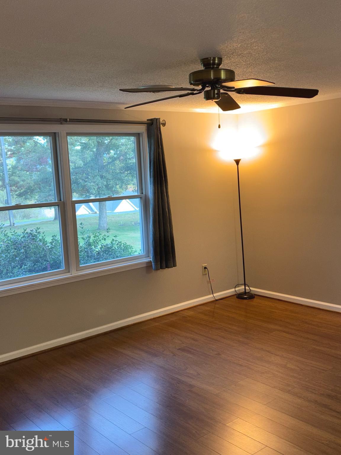 25 Nelson Lane Berkeley Springs, WV 25411 - Photo 10 of 27 a view of a room with wooden floor and a window