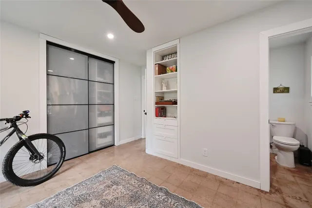 a view of a hallway with closet
