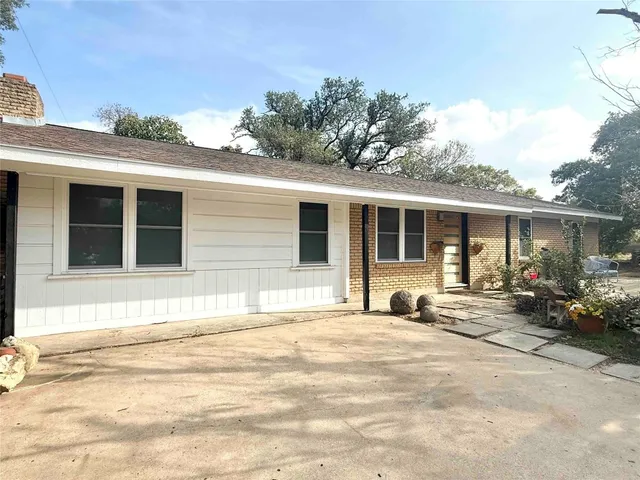 a front view of a house with a patio
