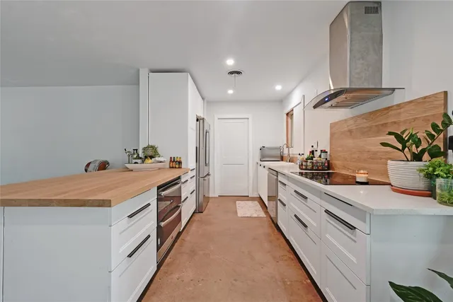 a large kitchen with a lot of counter space