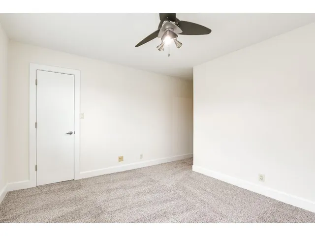 a front view of a house with a garage