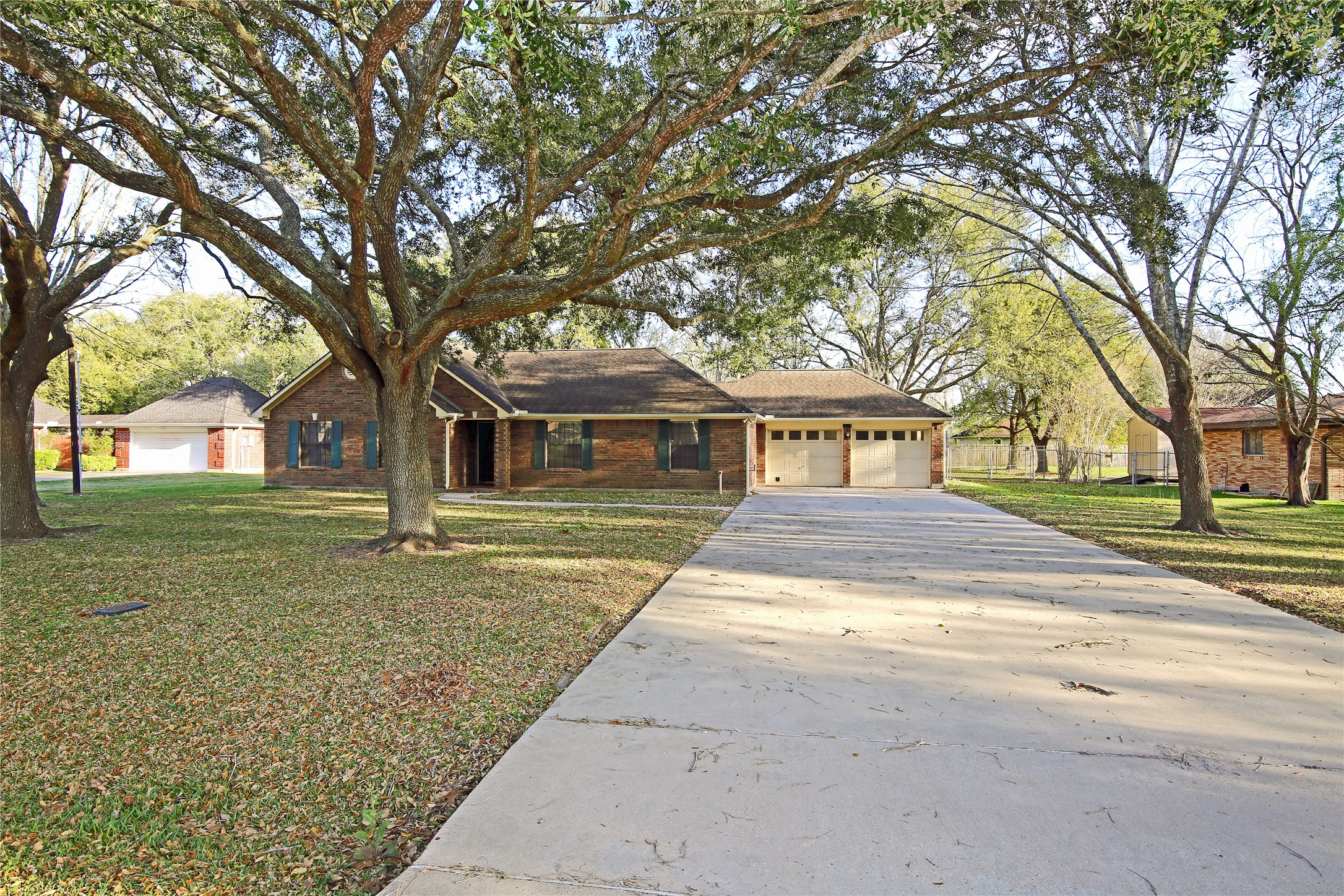 12002 10th Street Santa Fe, TX 77510 - Photo 2 of 35 Double Driveway for your family and friends when you entertain!