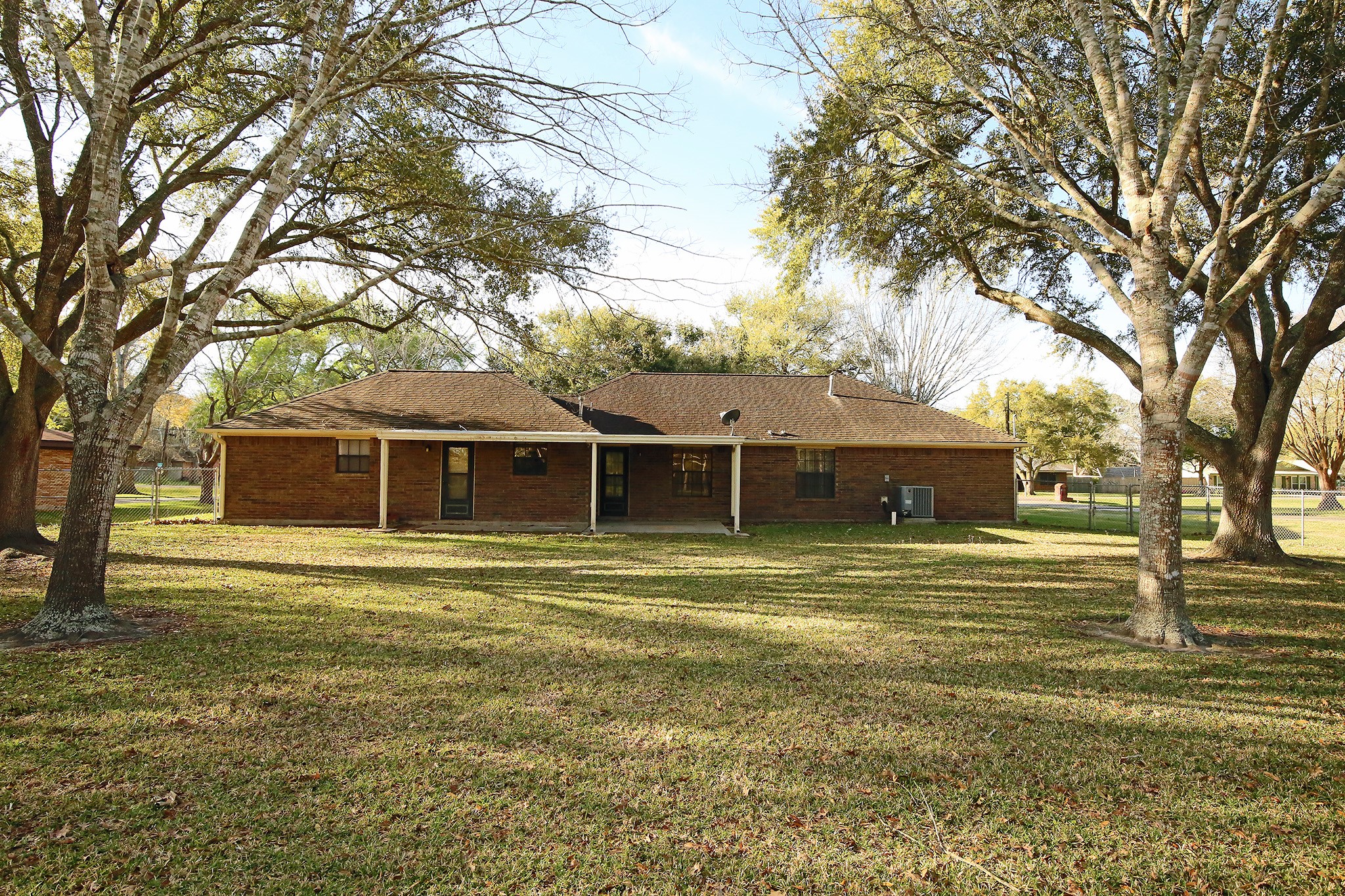 12002 10th Street Santa Fe, TX 77510 - Photo 29 of 35 Back yard looking towards the house.