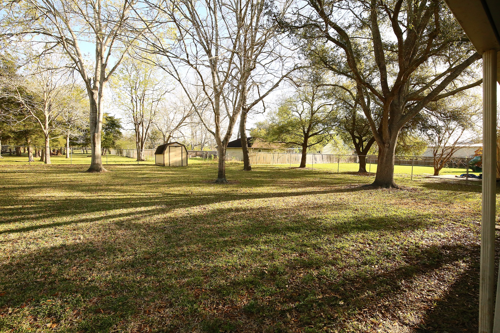 12002 10th Street Santa Fe, TX 77510 - Photo 32 of 35 Little Storage Shed for the Lawn Equipment!