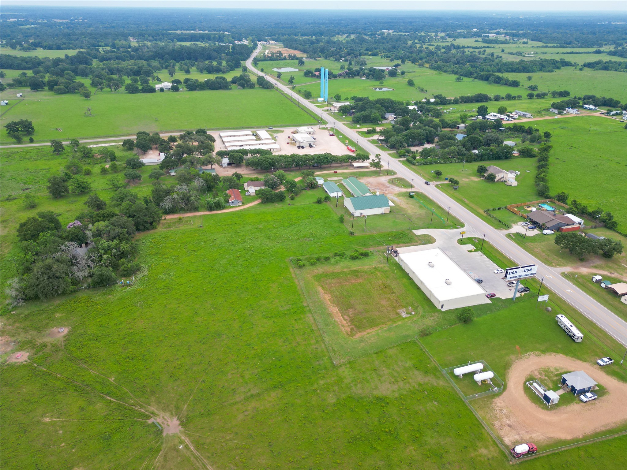 2 Fm 1488 Road Magnolia, TX 77354 - Photo 19 of 27 an aerial view of a city with lots of residential buildings ocean and mountain view in back