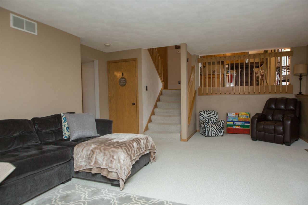 7068 Rye Ridge Trail Cherry Valley, IL 61016 - Photo 13 of 23 a living room with furniture and a couch
