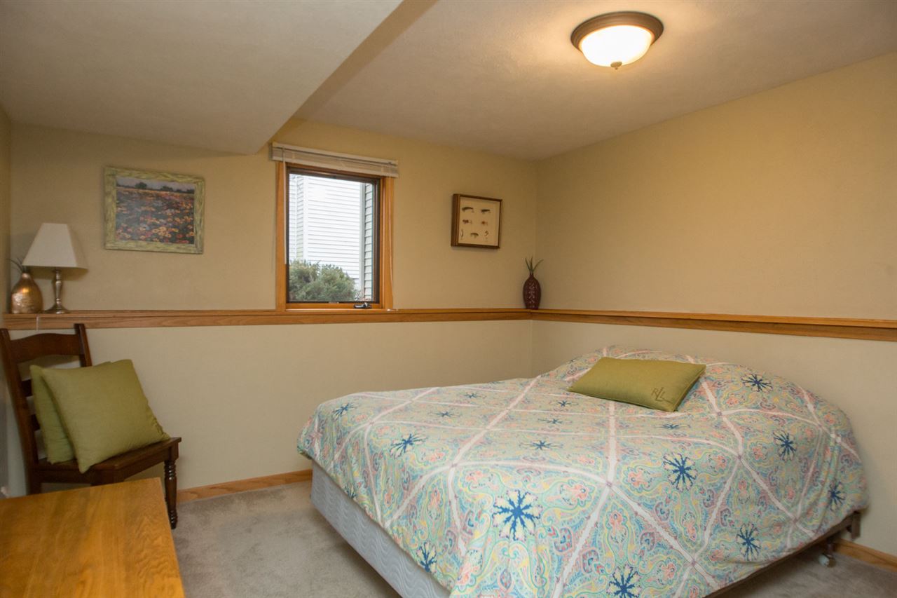 7068 Rye Ridge Trail Cherry Valley, IL 61016 - Photo 21 of 23 a bedroom with a bed and window