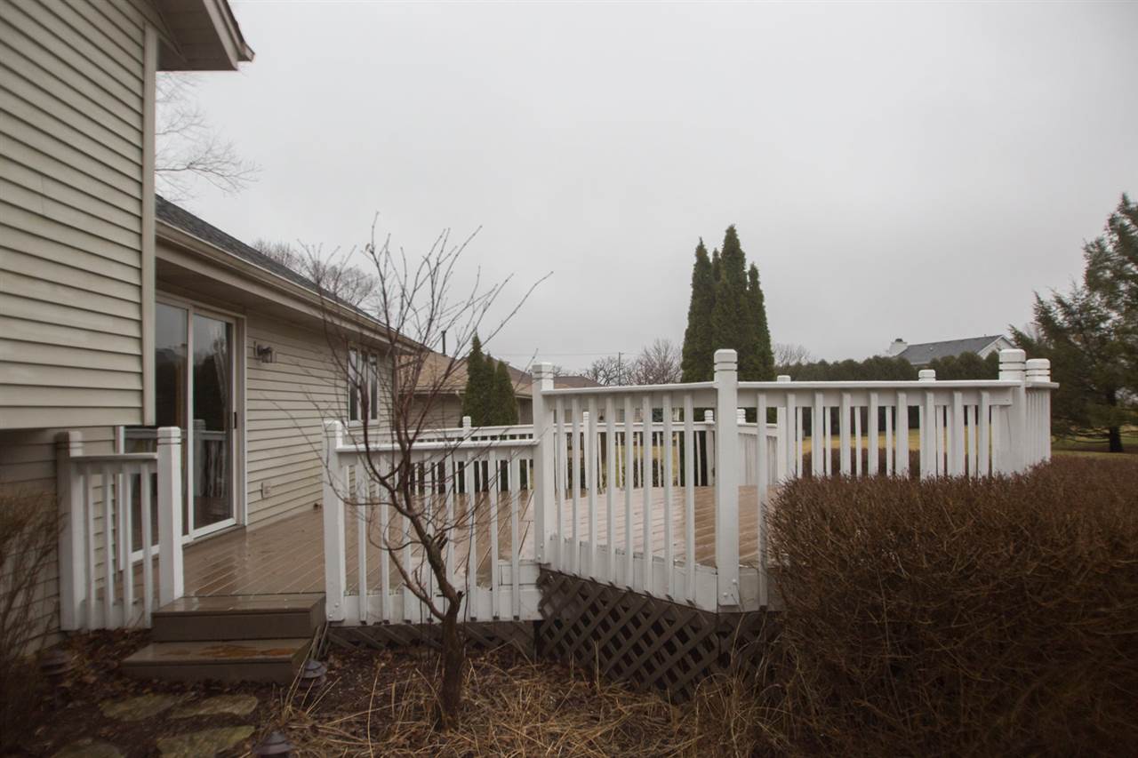 7068 Rye Ridge Trail Cherry Valley, IL 61016 - Photo 5 of 23 a view of a house with backyard and trees