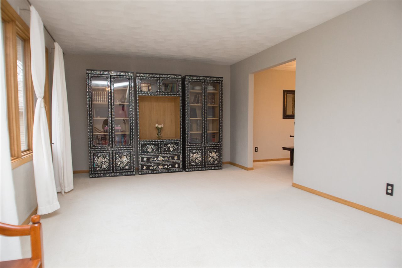 7068 Rye Ridge Trail Cherry Valley, IL 61016 - Photo 6 of 23 an empty room with windows