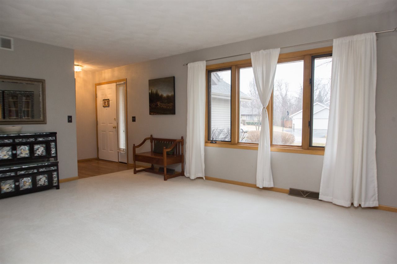 7068 Rye Ridge Trail Cherry Valley, IL 61016 - Photo 7 of 23 a view of livingroom with furniture and a window