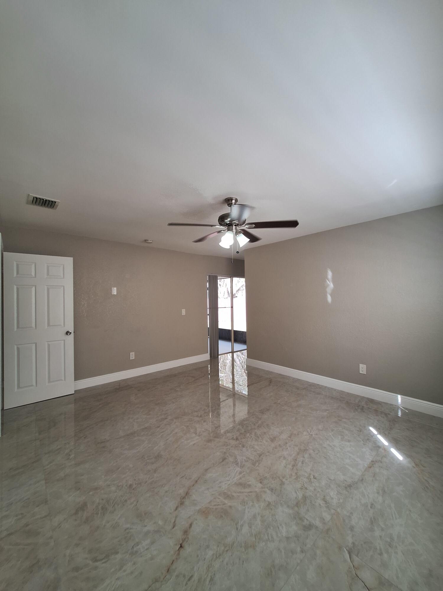 9219 Southwest 1st Place Boca Raton, FL 33428 - Photo 15 of 22 15) Master Bedroom with access to terrac