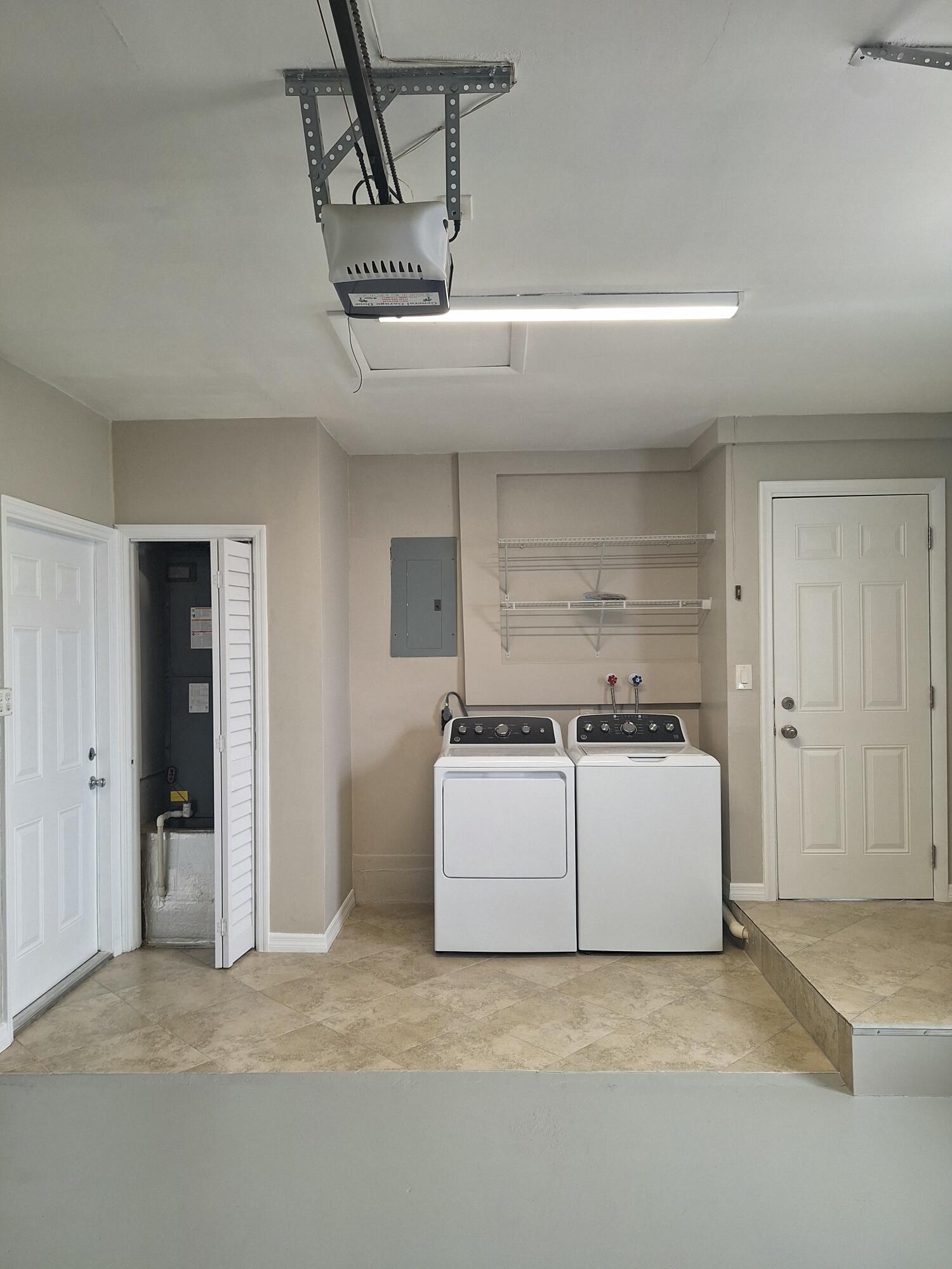 9219 Southwest 1st Place Boca Raton, FL 33428 - Photo 20 of 22 20) Garage Laundry, New washer & Dryer,