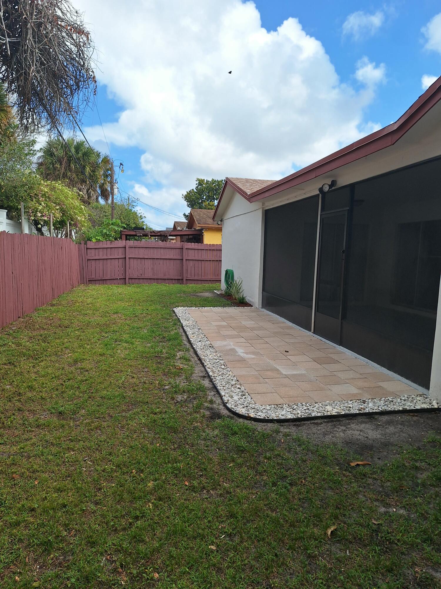 9219 Southwest 1st Place Boca Raton, FL 33428 - Photo 22 of 22 22) Fenced Patio & Barbecue area