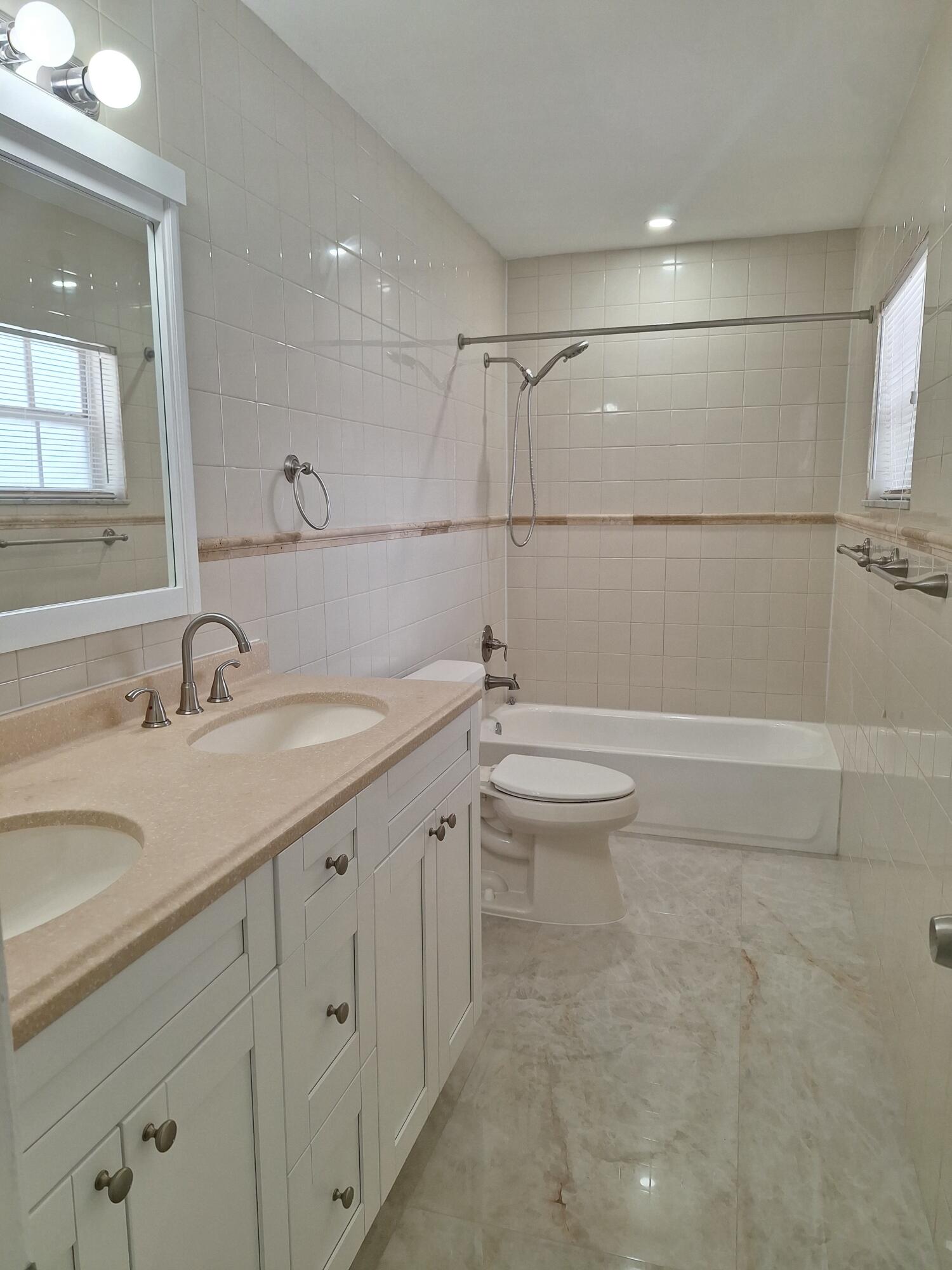 9219 Southwest 1st Place Boca Raton, FL 33428 - Photo 9 of 22 09) Hallway Bathroom