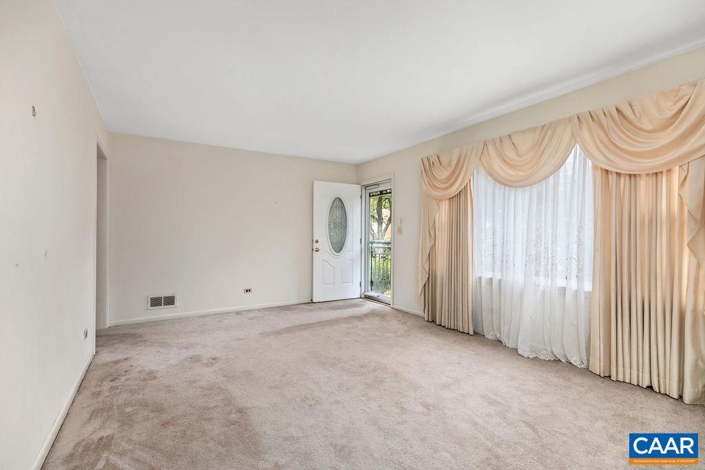 1905 Swanson Drive Charlottesville, VA 22901 - Photo 16 of 37 an empty room with a door