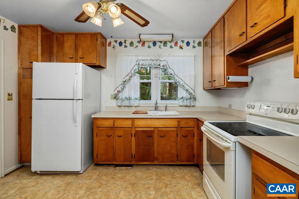1905 Swanson Drive Charlottesville, VA 22901 - Photo 19 of 37 a kitchen with stainless steel appliances granite countertop a refrigerator a sink dishwasher a stove and a refrigerator