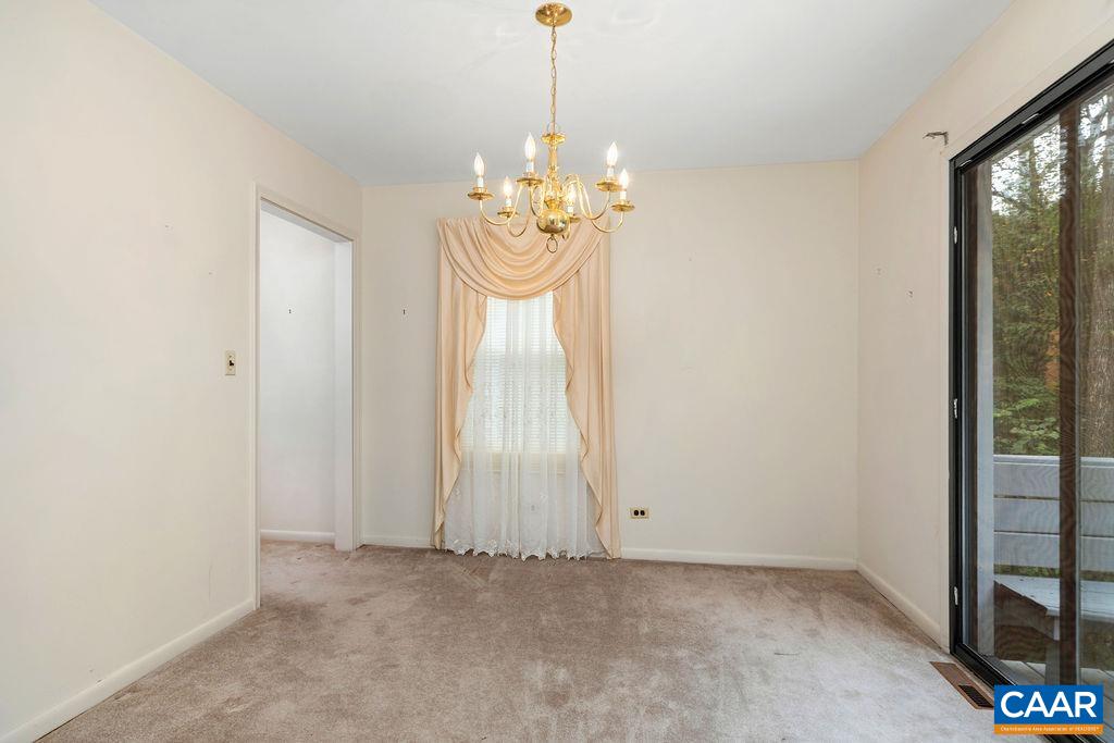 1905 Swanson Drive Charlottesville, VA 22901 - Photo 21 of 37 a view of a chandelier in a room