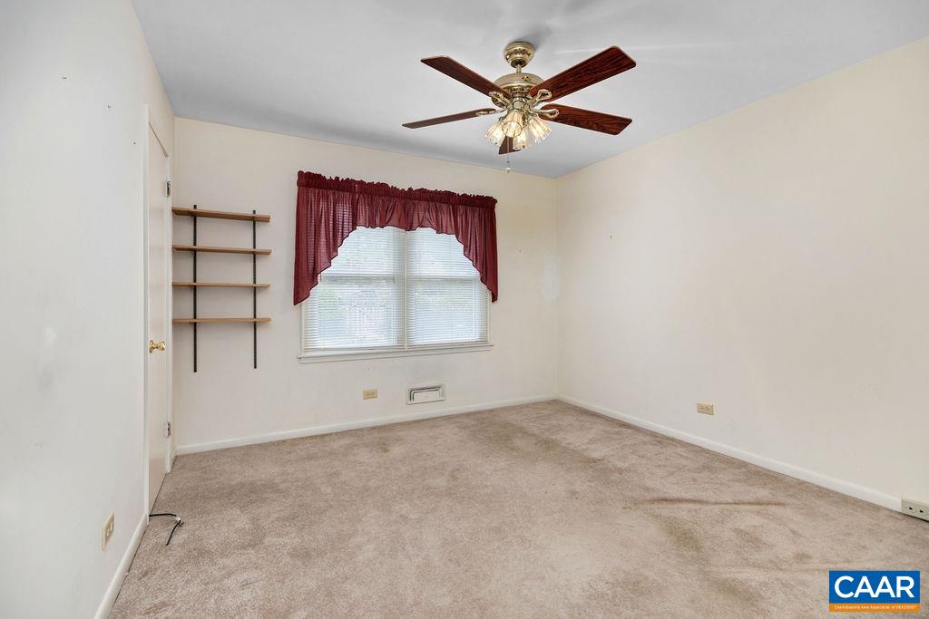 1905 Swanson Drive Charlottesville, VA 22901 - Photo 23 of 37 an empty room with windows and fan