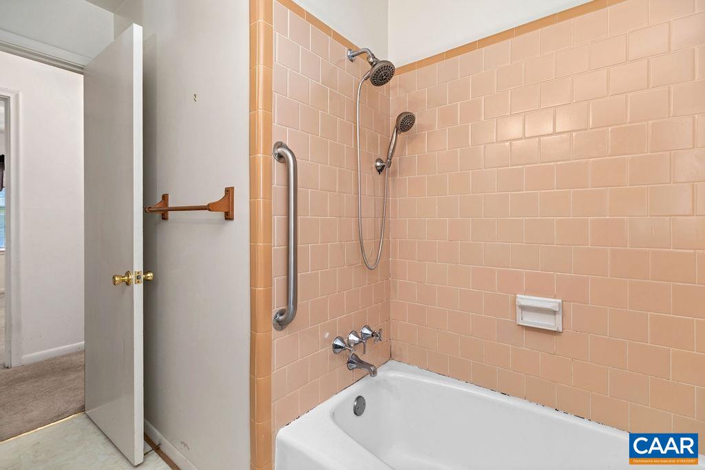 1905 Swanson Drive Charlottesville, VA 22901 - Photo 26 of 37 a bathroom with a white bath tub